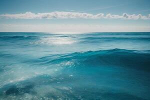 a beautiful sunset over the ocean with waves photo