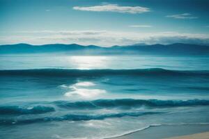 a beautiful blue ocean with waves and clouds photo