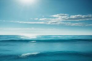 a beautiful blue ocean with waves and clouds photo