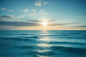 a beautiful blue ocean with waves and clouds photo