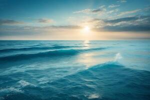 a beautiful blue ocean with waves and clouds photo