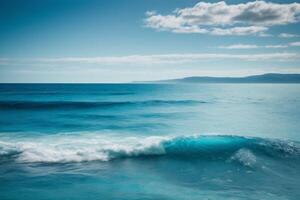 blue ocean with mountains and clouds photo