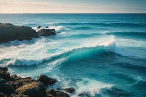 blue ocean with mountains and clouds photo