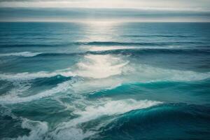 blue ocean with clouds and sun in the sky photo