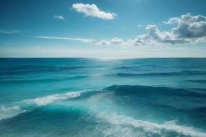 blue ocean with clouds and sun in the sky photo