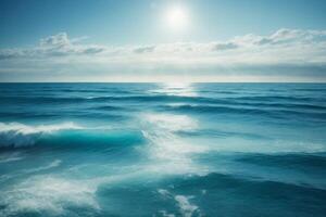 a beautiful beach with waves and blue sky photo