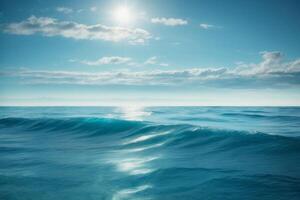 a beautiful beach with waves and blue sky photo