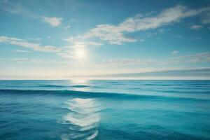 a beautiful beach with waves and blue sky photo