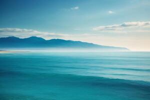 a view of the ocean from above with waves photo