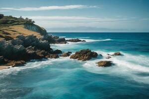 blue ocean waves and sun rays in the ocean photo