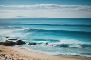 blue ocean waves and sun rays in the ocean photo