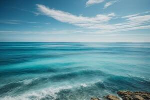 blue ocean waves and sun rays in the ocean photo