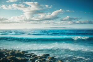 blue ocean waves and sun rays in the ocean photo