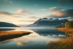 un lago con rocas y arboles a puesta de sol foto