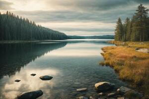 un montaña lago rodeado por césped y arboles foto