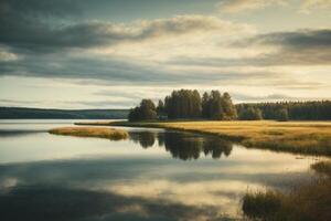 a mountain and lake are reflected in the water photo