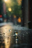 gotas de lluvia en el suelo en un charco foto