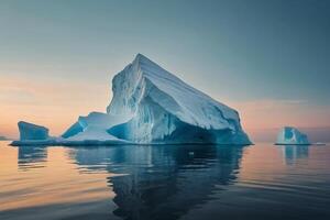 icebergs floating in the water with a cloudy sky photo