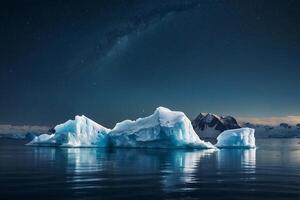 icebergs floating in the water at sunset photo