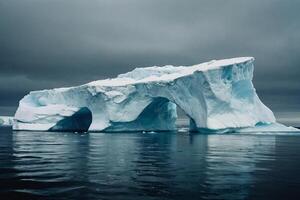 icebergs floating in the water at sunset photo