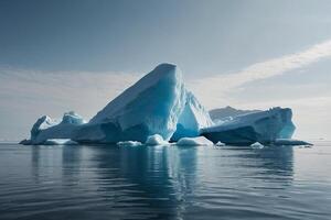 icebergs floating in the water at sunset photo