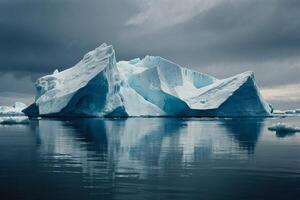 icebergs floating in the water at sunset photo