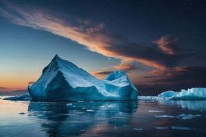 icebergs floating in the water at sunset photo