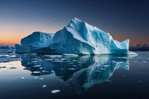 icebergs float in the water at sunset photo