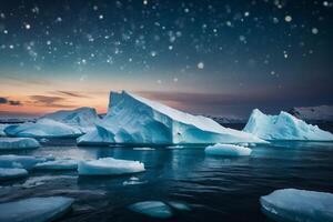 icebergs float in the water at sunset photo