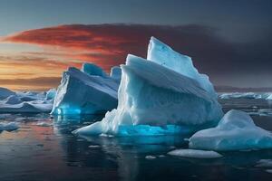 icebergs float in the water at sunset photo