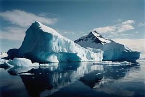 icebergs float in the water at sunset photo