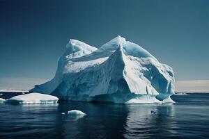 icebergs floating in the water at sunset photo