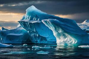 icebergs floating in the water at sunset photo