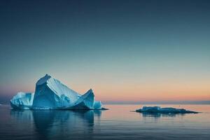 icebergs floating in the water at sunset photo