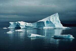 icebergs at night in the ocean with a milky way in the background photo