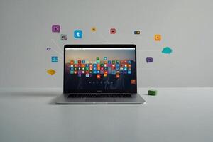 a laptop with icons floating above it photo