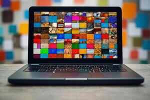 a laptop with colorful squares on the screen photo