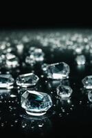 diamonds floating in water on a black background photo