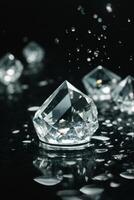 diamonds floating in water on a black background photo