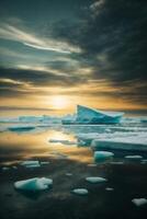 icebergs floating in the water with the sun setting photo