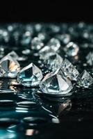 diamonds on a black surface with water photo