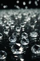 diamonds on a black surface with water photo