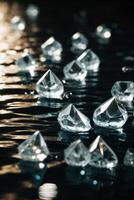 diamonds on a black surface with water photo