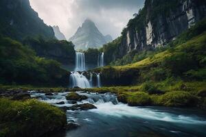 a waterfall in the middle of a green valley photo