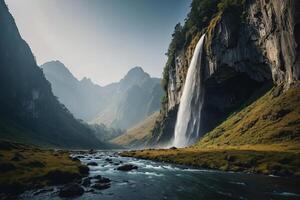 a waterfall in the middle of a green valley photo