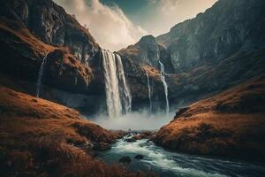 a waterfall in the mountains with a blue sky photo