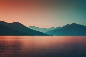 a lake with mountains in the background at sunset photo