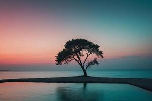 a lone tree stands on a small island in the middle of the ocean photo