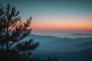 a view of the mountains at sunset photo