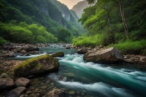 a river flows through a forest with mountains in the background photo